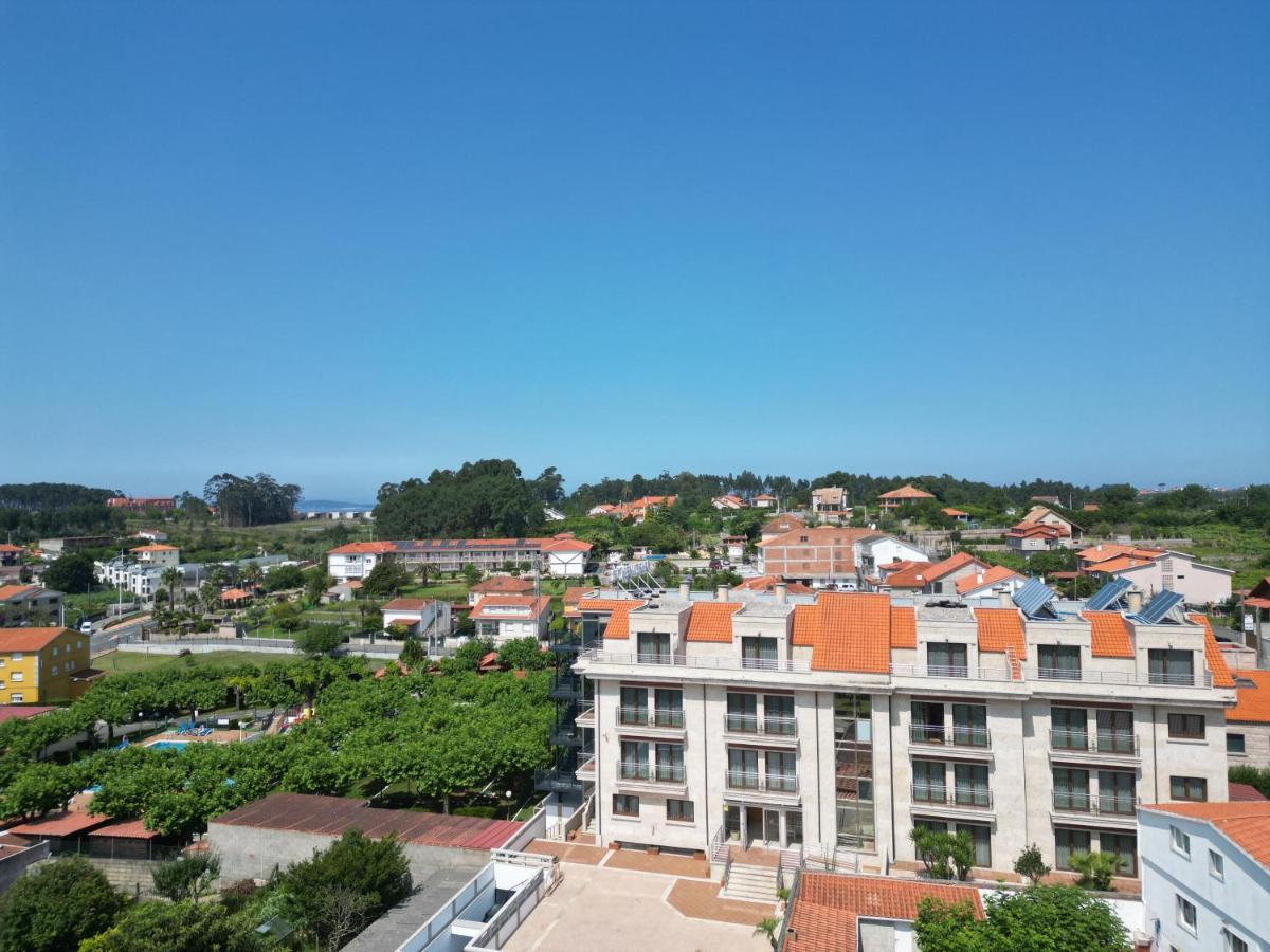 Apartamentos Playa Canelas Sanxenxo Exteriör bild